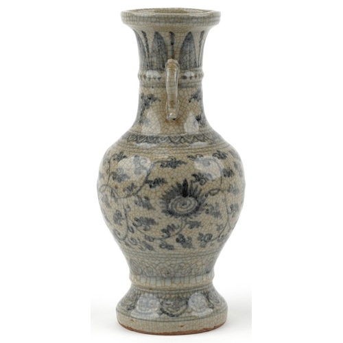 274 - A Chinese blue and white porcelain crackle glazed vase with twin handles, 30cm high.