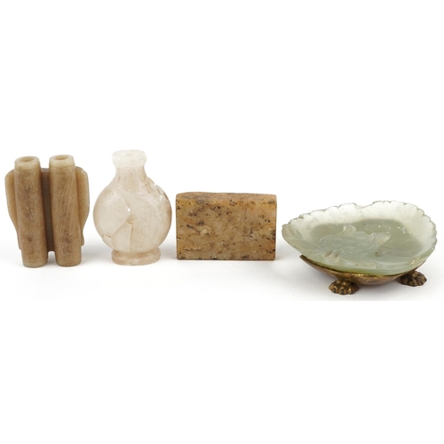 361 - Chinese carved stone objects including two scent bottles and a translucent dish raised on a gilt bro... 