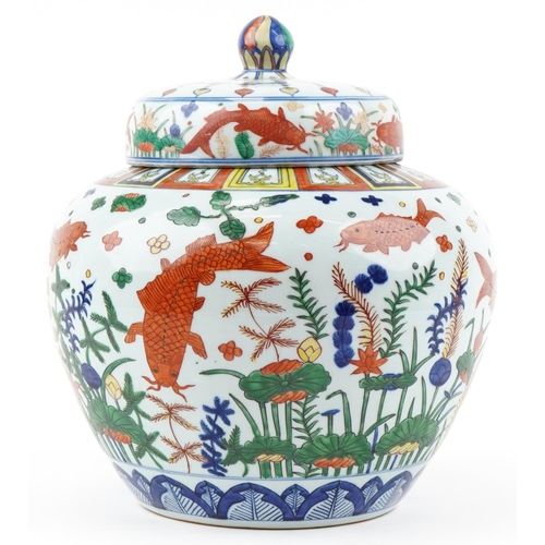 357 - A very large Chinese porcelain jar and cover hand painted in multiple colours with Koi carp and aqua... 