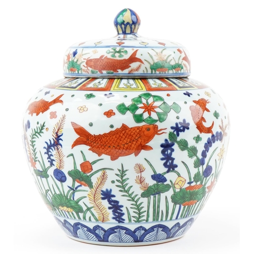 357 - A very large Chinese porcelain jar and cover hand painted in multiple colours with Koi carp and aqua... 