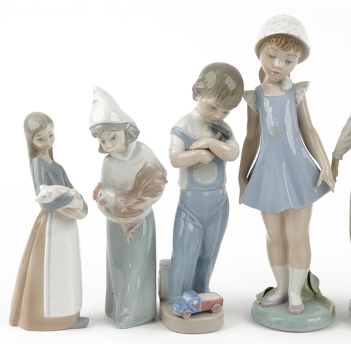 1195 - Seven Lladro porcelain figures and figurines including young fisherman and girl holding a chicken, t... 