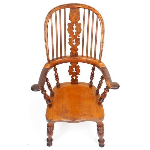 1133 - A late 19th/early 20th century yew and elm pierced splat back Windsor armchair, 108cm H x 68cm W x 6... 