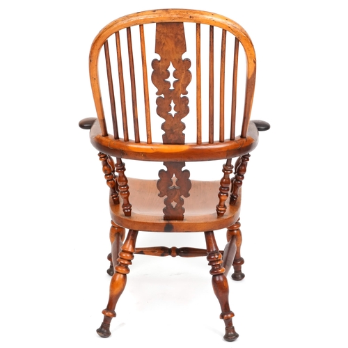 1133 - A late 19th/early 20th century yew and elm pierced splat back Windsor armchair, 108cm H x 68cm W x 6... 