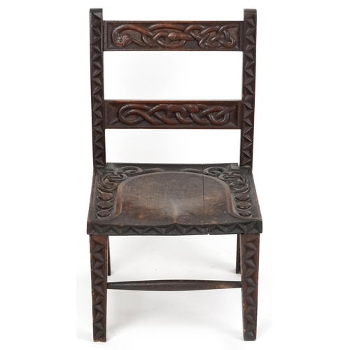  An early 20th century Arts & Crafts oak low chair circa 1910, probably by The Bray Art Furniture Ind... 