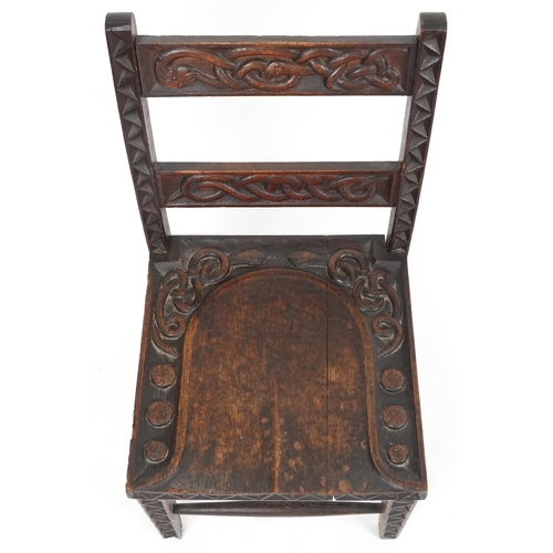  An early 20th century Arts & Crafts oak low chair circa 1910, probably by The Bray Art Furniture Ind... 