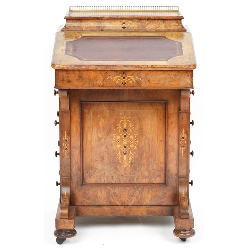 1069 - A late Victorian walnut Davenport desk with boxwood inlaid decoration, 87cm H x 55cm W x 54cm D.