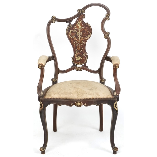 1088 - A late 19th century French mahogany and inlaid salon armchair, the scrolled back above an overstuffe... 