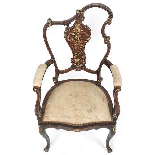 1088 - A late 19th century French mahogany and inlaid salon armchair, the scrolled back above an overstuffe... 