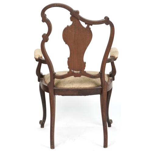 1088 - A late 19th century French mahogany and inlaid salon armchair, the scrolled back above an overstuffe... 