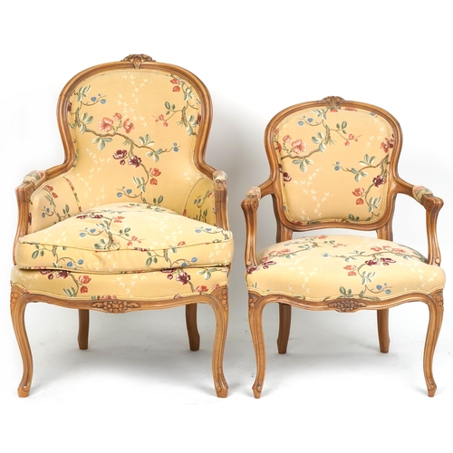 1014 - A 20th century French fauteuil armchair upholstered in floral fabric together with a similar salon a... 