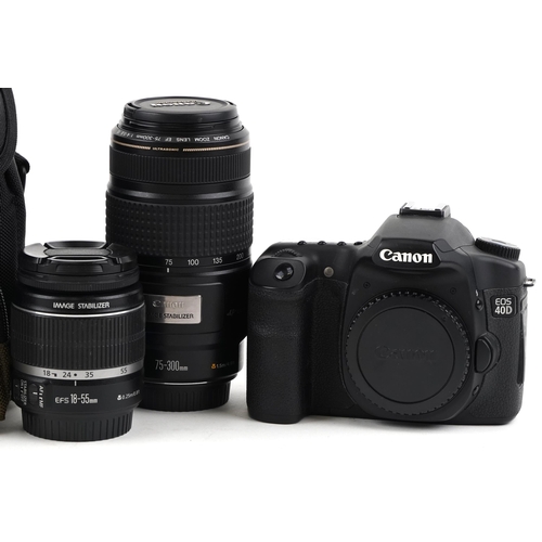 515 - Canon 400D camera with two lenses, 18-55mm and 75-300 IS USM.