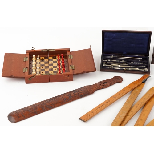 307 - Sundry items including a Chinese hardwood page turner, drawing apparatus, rosewood box, banknotes an... 