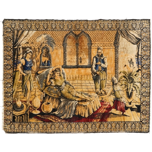 1112 - An early to mid 20th century Middle Eastern tapestry wall hanging depicting a lady being fanned and ... 