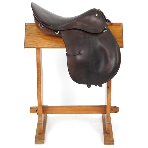 1157 - A Gidden of London, Spring Tree 17 inch brown leather saddle.