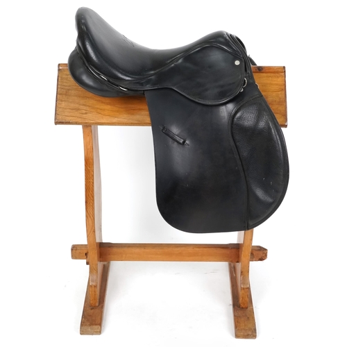 1154 - An Ideal Saddle Co. 16.5 inch black leather saddle.