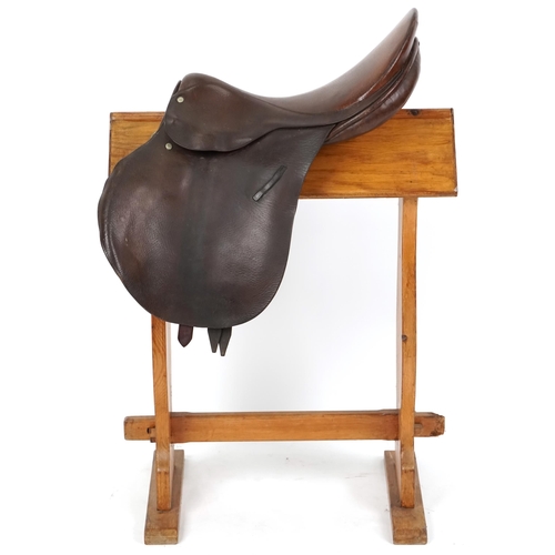 1163 - A 16 inch brown leather saddle.