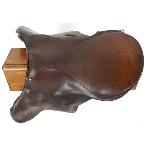 1163 - A 16 inch brown leather saddle.