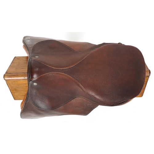 1155 - A Gidden of London 17 inch brown leather saddle.