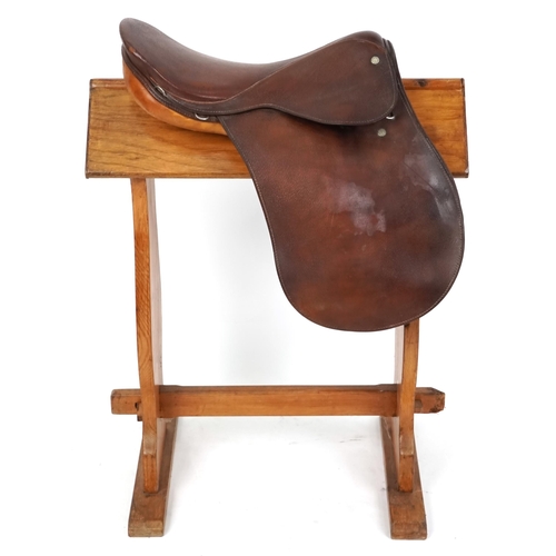 1155 - A Gidden of London 17 inch brown leather saddle.