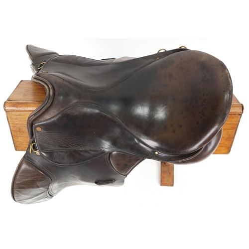 1156 - A Minister Saddlery 16.5 inch brown leather saddle.