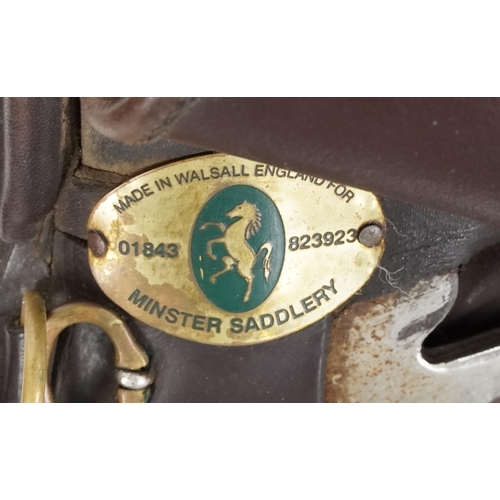 1156 - A Minister Saddlery 16.5 inch brown leather saddle.