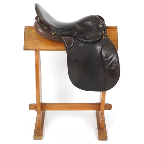 1156 - A Minister Saddlery 16.5 inch brown leather saddle.