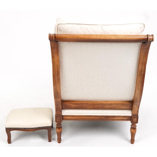 1013 - A modern Wesley-Barrell scroll armchair upholstered in ivory floral fabric, 85cm H x 76cm W x 90cm D... 