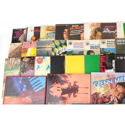 2023 - Vinyl LP records including T-Rex, Elvis Presley, Santana, The Bee Gees and some classical examples.