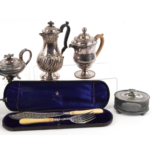 1431 - A group of Victorian and later plated items including a teapot on stand with burner and fish servers... 