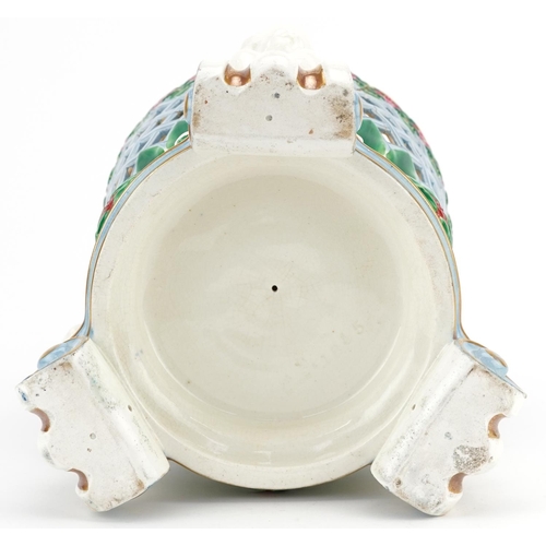 1367 - A late 19th/early 20th century continental Majolica jardinière with hand painted and pierced decorat... 