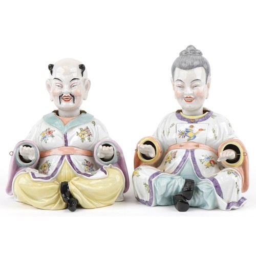  A pair of early 20th century Dresden porcelain nodding Chinese figures, each with hand painted decor... 