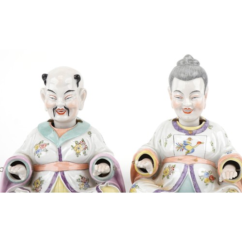  A pair of early 20th century Dresden porcelain nodding Chinese figures, each with hand painted decor... 