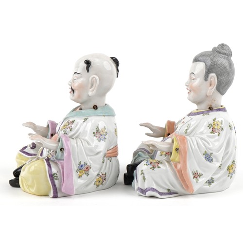  A pair of early 20th century Dresden porcelain nodding Chinese figures, each with hand painted decor... 