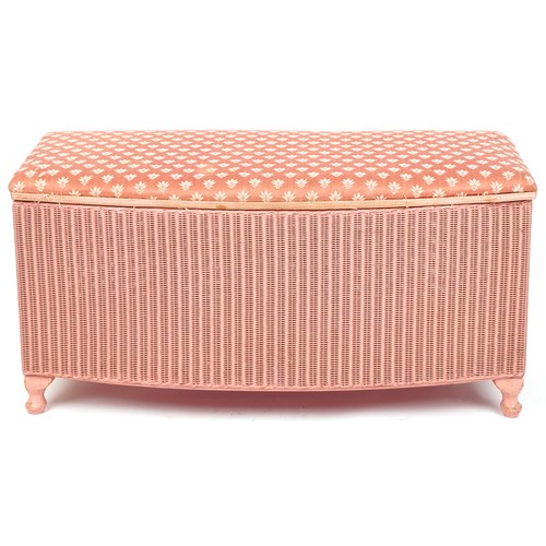 1004 - A pink Lloyd Loom box seat stool raised on cabriole legs, 47cm H x 93cm W x 43cm D.