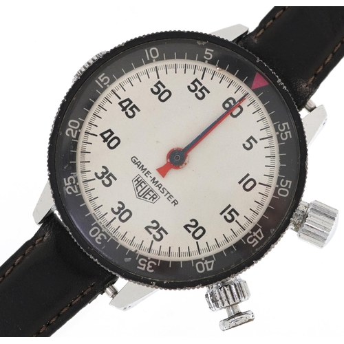 3306 - A Heuer Game-Master stainless steel cased stopwatch with black leather strap, the dial 5.5cm in diam... 