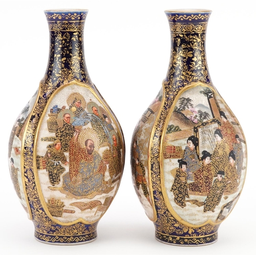  A pair of Japanese Satsuma earthenware vases, late 19th century, each decorated with three tradition... 