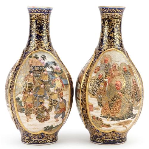  A pair of Japanese Satsuma earthenware vases, late 19th century, each decorated with three tradition... 