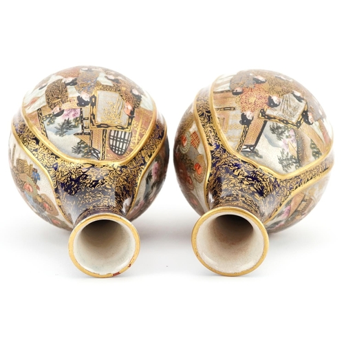  A pair of Japanese Satsuma earthenware vases, late 19th century, each decorated with three tradition... 