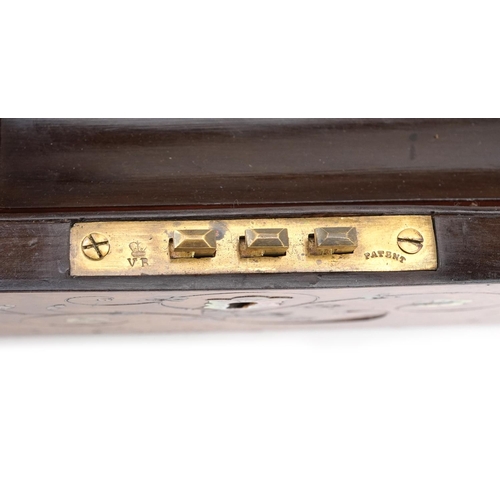 143 - A mid Victorian walnut and mother of pearl inlaid writing slope, 14cm H x 35cm W x 23cm D.