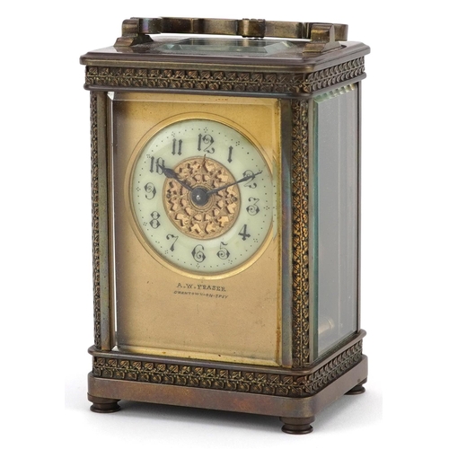 66 - An Edwardian gilt brass carriage clock with white enamelled dial, detailed A.W. Fraser, Grantown-on-... 