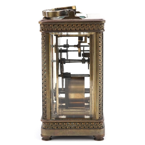 66 - An Edwardian gilt brass carriage clock with white enamelled dial, detailed A.W. Fraser, Grantown-on-... 