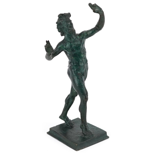 73 - A 20th century green patinated bronze figure of a faun, 15cm high.