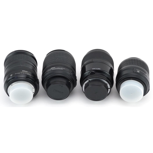 505 - Four Nikon cameral lenses comprising 18-55mm VR, 18-200mm VR, 18-105mm and 105mm F/2.8 macro.