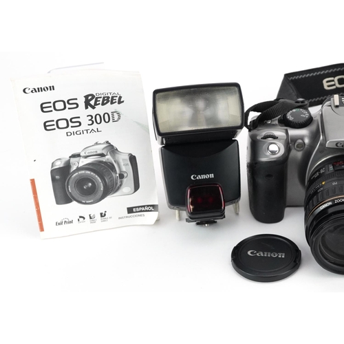 502 - Canon EOS Digital Rebel camera with two lenses and Speedlite 380 EX flash.