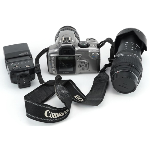 502 - Canon EOS Digital Rebel camera with two lenses and Speedlite 380 EX flash.