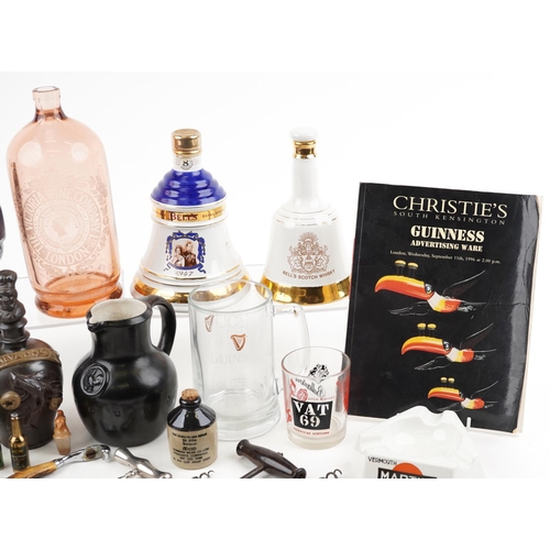 1457 - A collection of breweriana and advertising sundry items including Wade Bells whisky decanters, ashtr... 