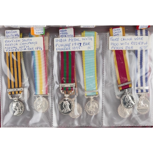 2418 - A collection of military interest miniature dress medals including Canadian Ghuzee Cabul medal, Chin... 