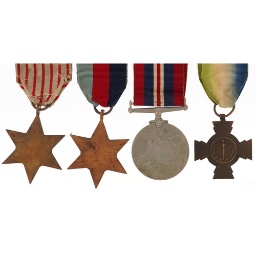 2430 - Three British military World War II medals and a France and Germany medal with ribbons.