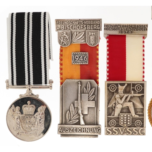 2487 - Six military interest medals with ribbons including Swiss Rifle trophy badge and New Zealand