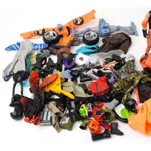 1287 - A large collection of vintage and later Action Man figures, clothes and accessories together with an... 